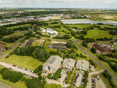 Drone image of Belasis Business Park showing buildings and green space